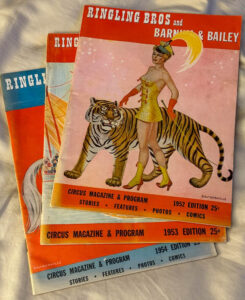 A picture of the Ernest Hemingway nonfiction piece "The Circus" as well as 3 copies of the magazine Ringling Brothers and Barnum Bailey Circus."