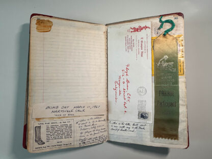 Photographs of the personal journals of Floyd Green of the E. Clamper Vitus fraternity