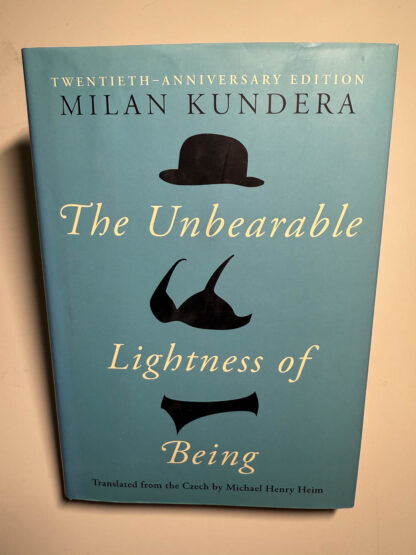 various pictures of the Milan Kundera book The Unbearable Lightness of Being