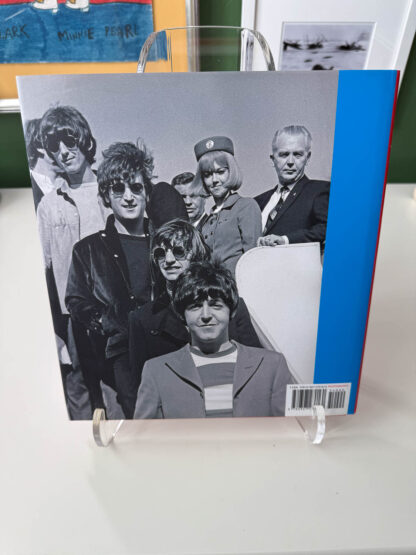 Various pictures of the book "Who Shot Rock & Roll" edited by Gail Buckland